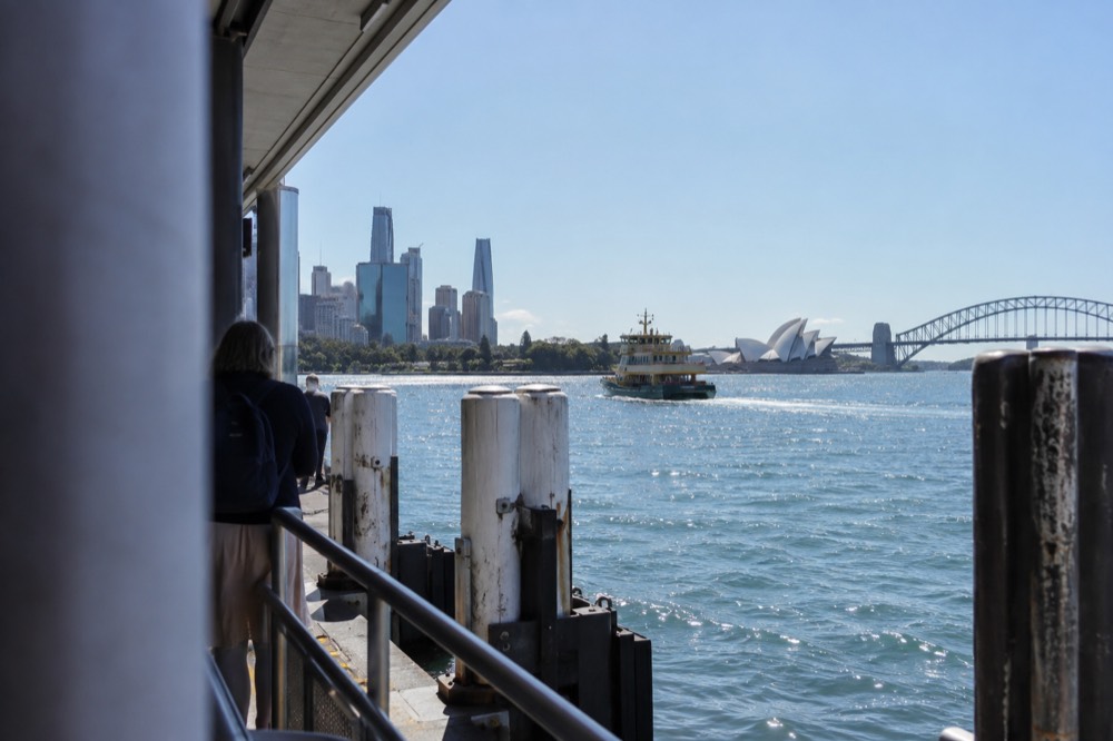 The Melbourne city skyline seen across the Yarra River on a clear afternoon