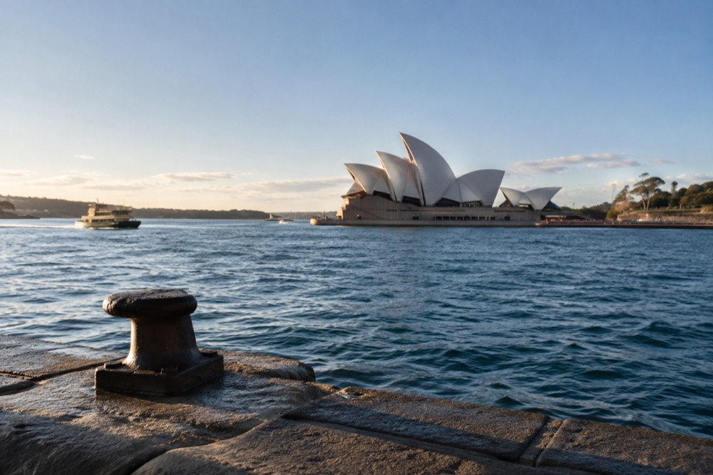 Sydney Opera House white sails against a blue sky seen from Circular Quay