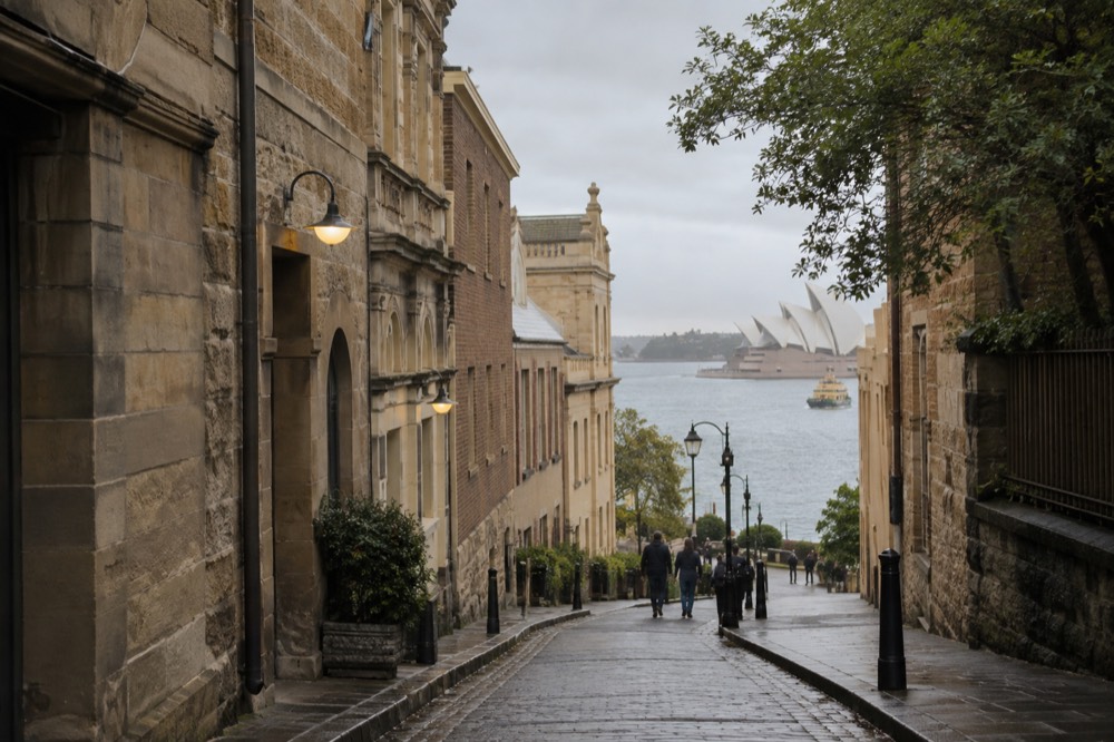 Sandstone buildings and laneways of The Rocks district in late afternoon light