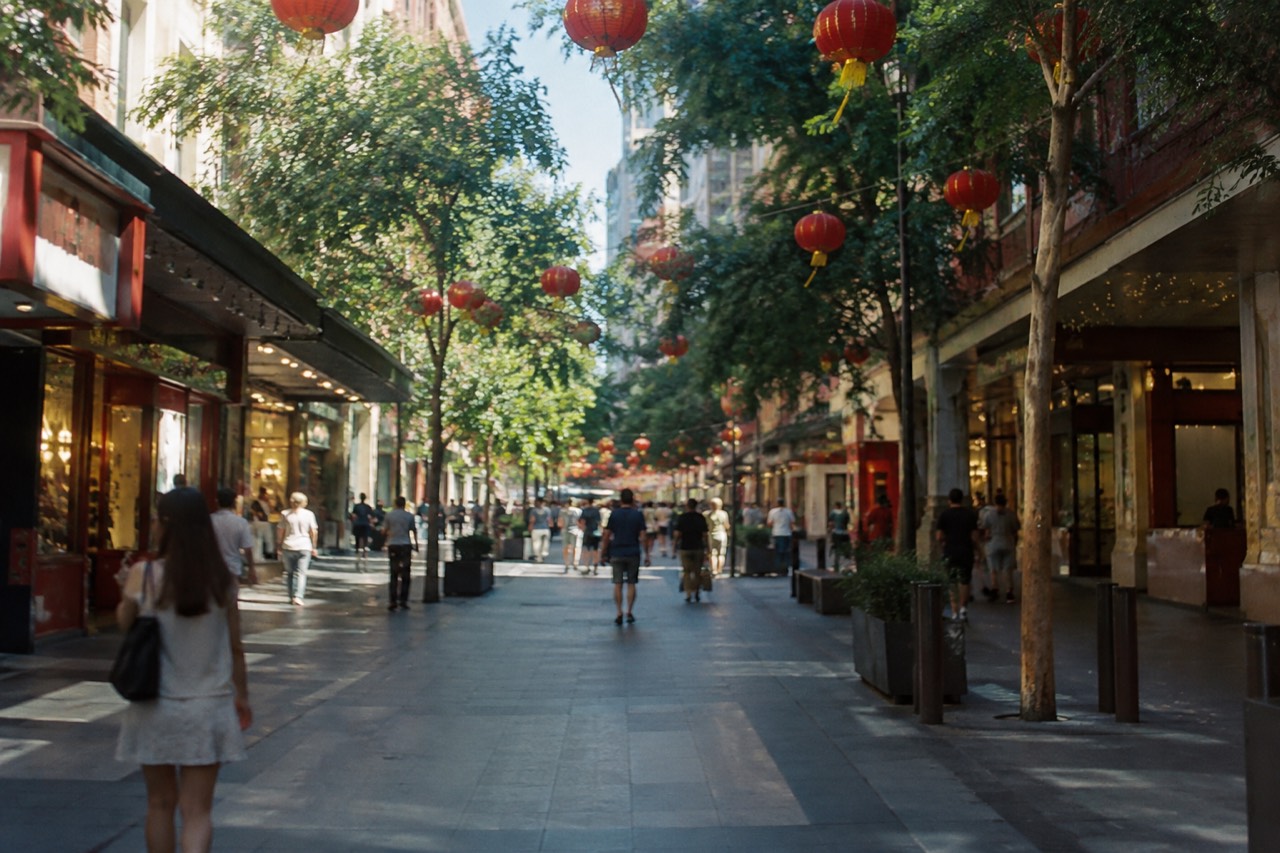 Dixon Street pedestrian mall in Sydney's Chinatown with lanterns strung overhead and shopfronts along the mall