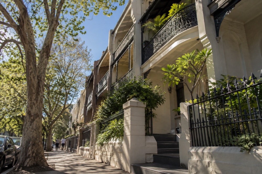 Sunlit terrace balconies on a quiet street in Potts Point near Kings Cross