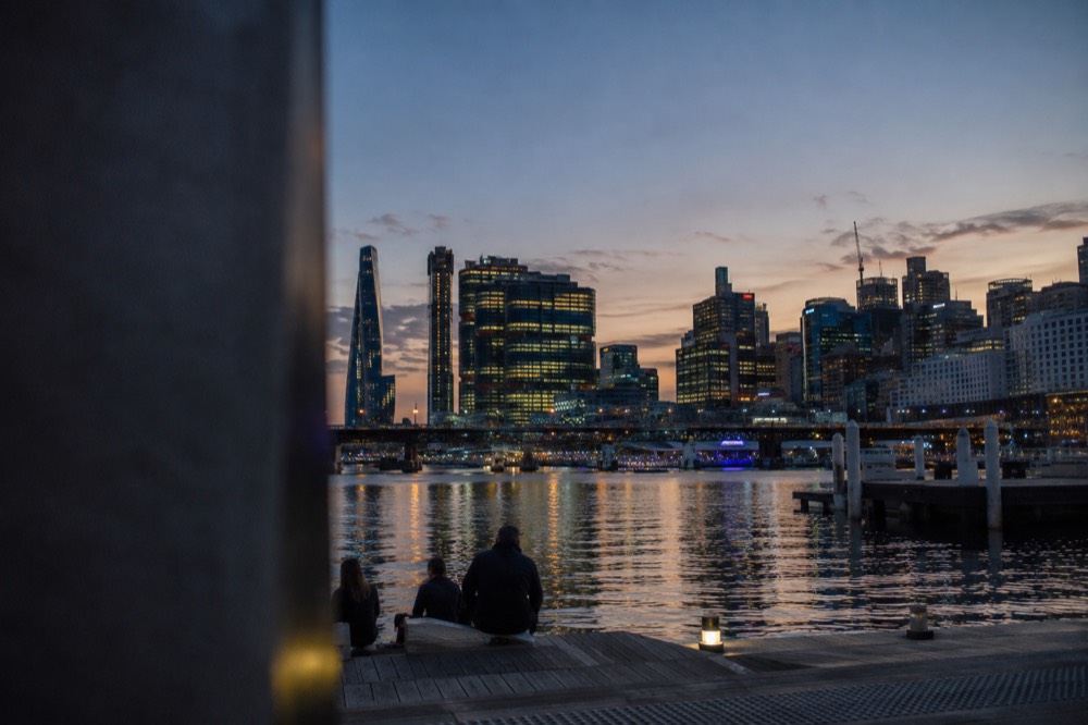 Sydney city skyline viewed across Darling Harbour at golden hour