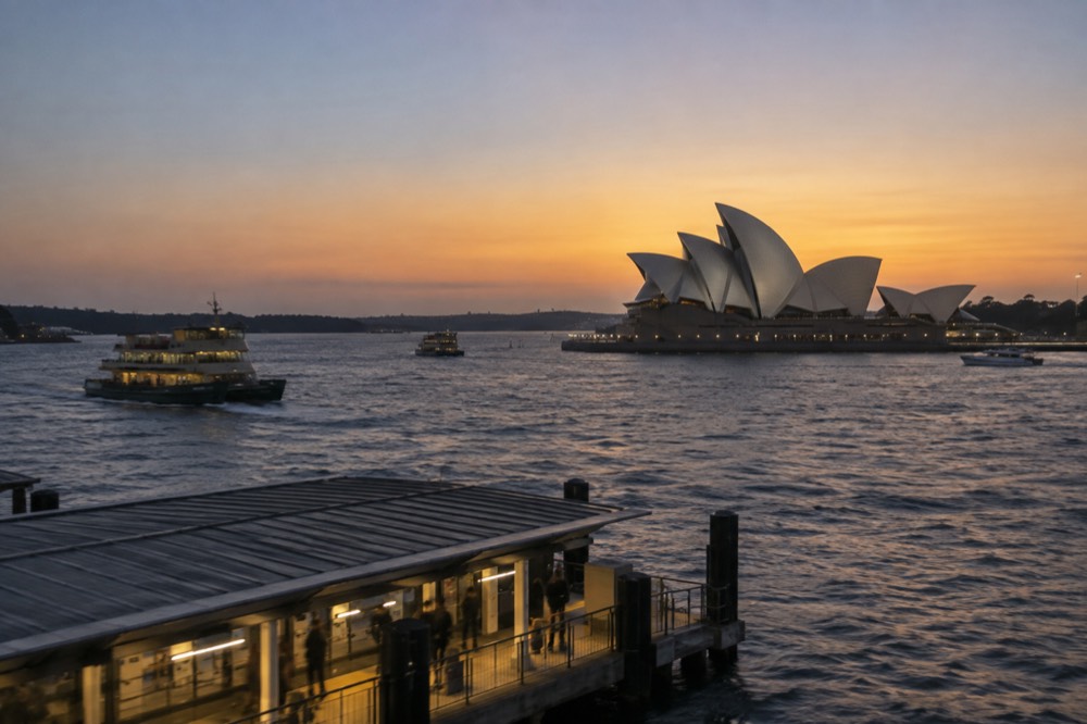 The Sydney Opera House seen across the water from Circular Quay ferries