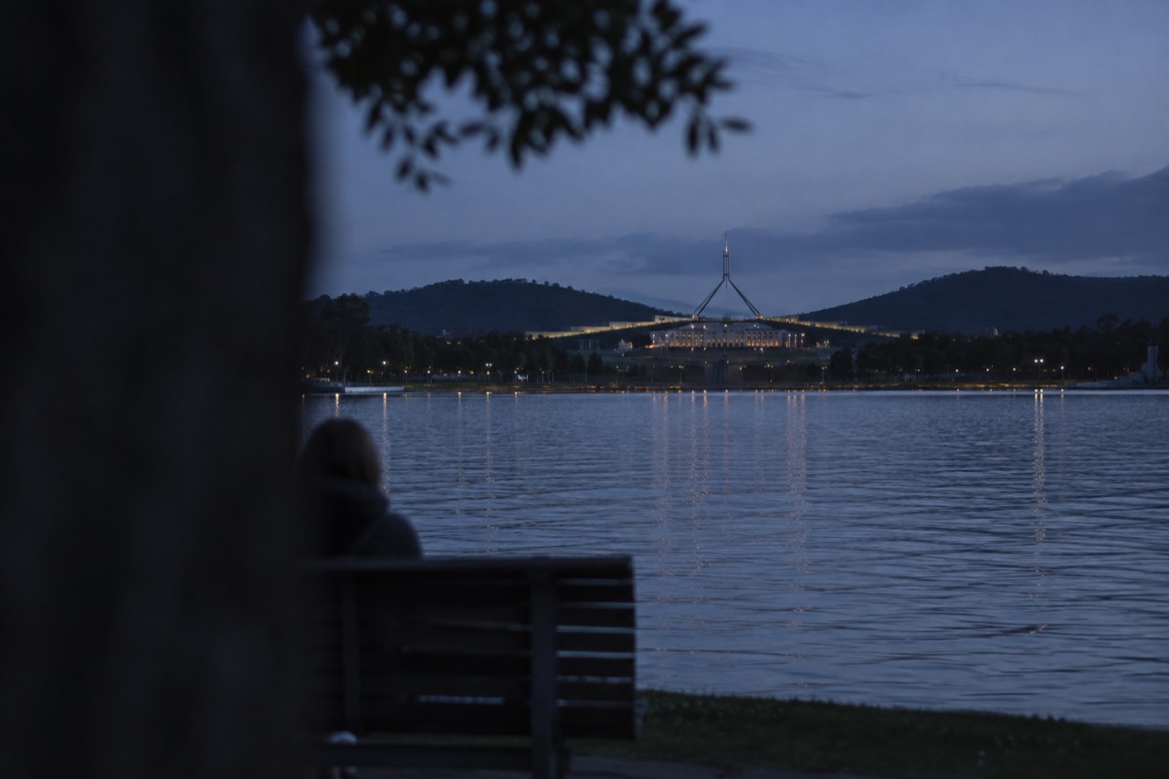 View over Lake Burley Griffin towards Parliament House in Canberra on a clear day