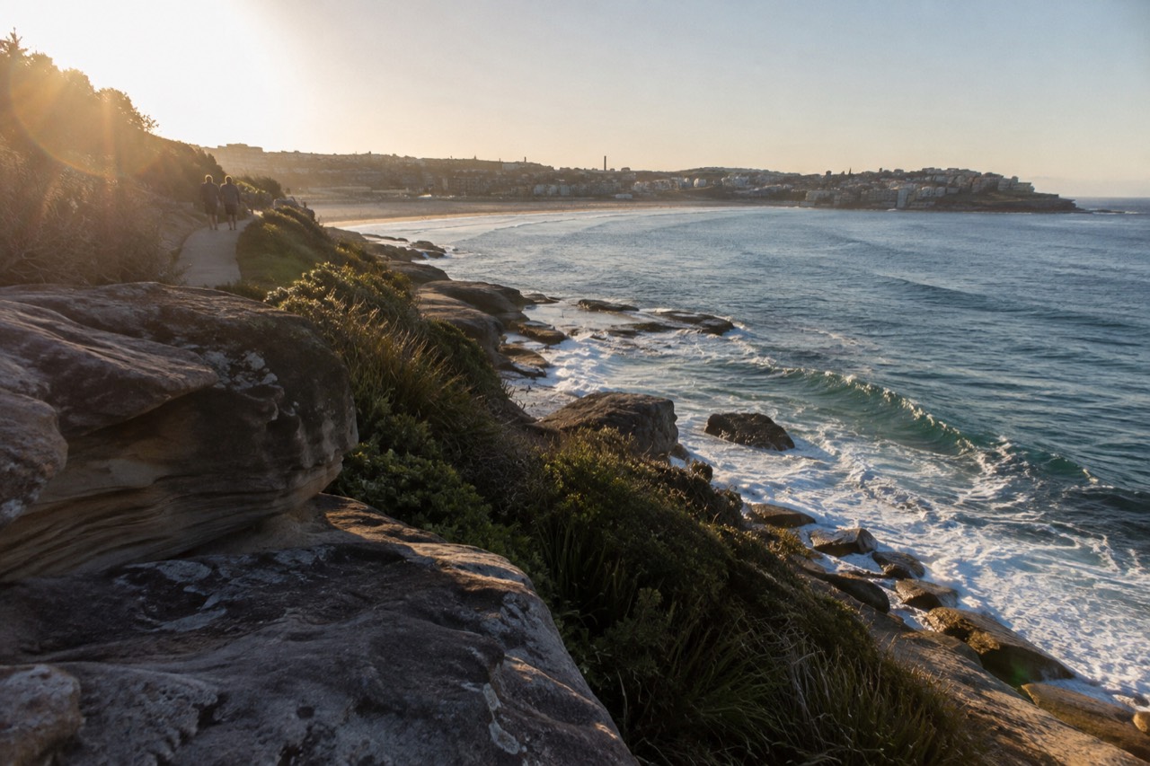 Sandstone cliffs above the ocean along the Bondi to Coogee coastal path on a clear morning