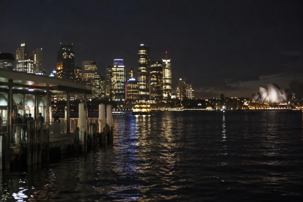 A night view of Sydney city lights from across the harbour