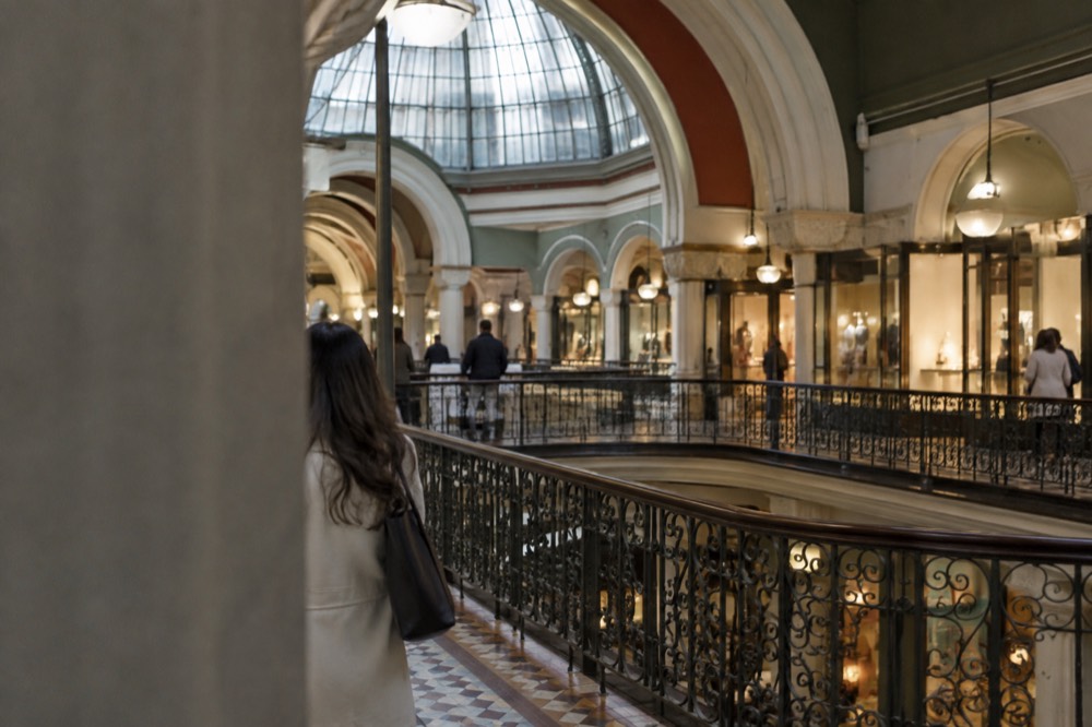 Queen Victoria Building interior with shopfronts beneath the glass dome