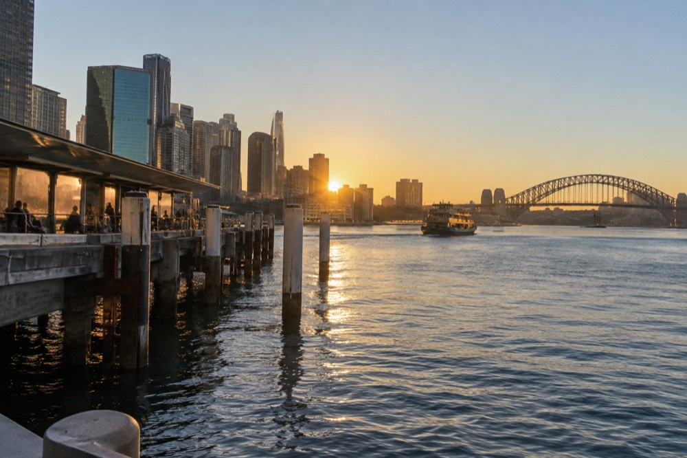 Clear winter sunrise over the harbour with crisp light on the water and the city skyline