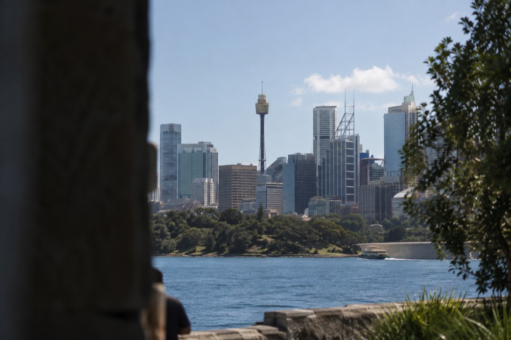 Sydney Tower rising above the city skyline on a clear afternoon