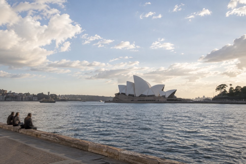 Sydney Opera House sails from the Circular Quay forecourt in early morning light