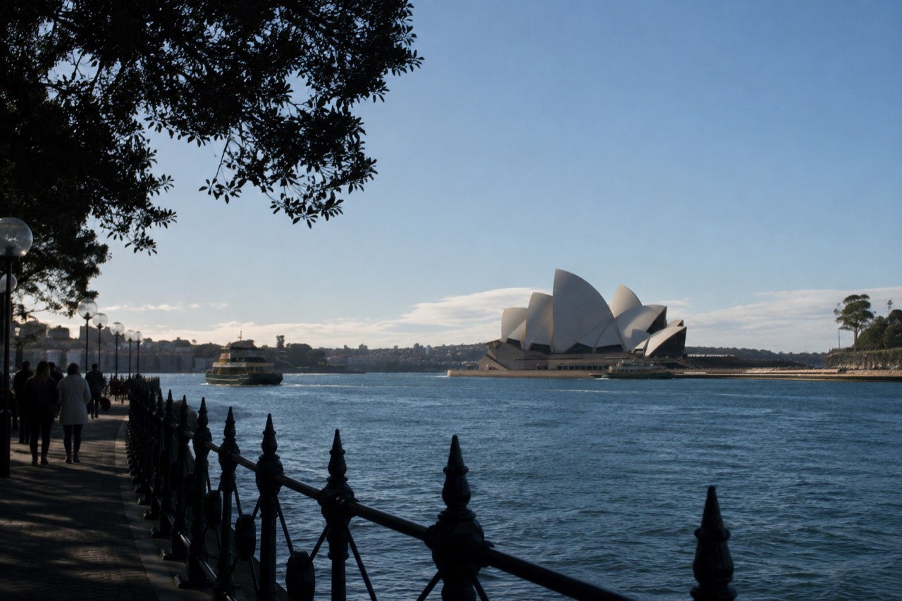 Sydney Opera House white sails seen across Circular Quay on a clear morning