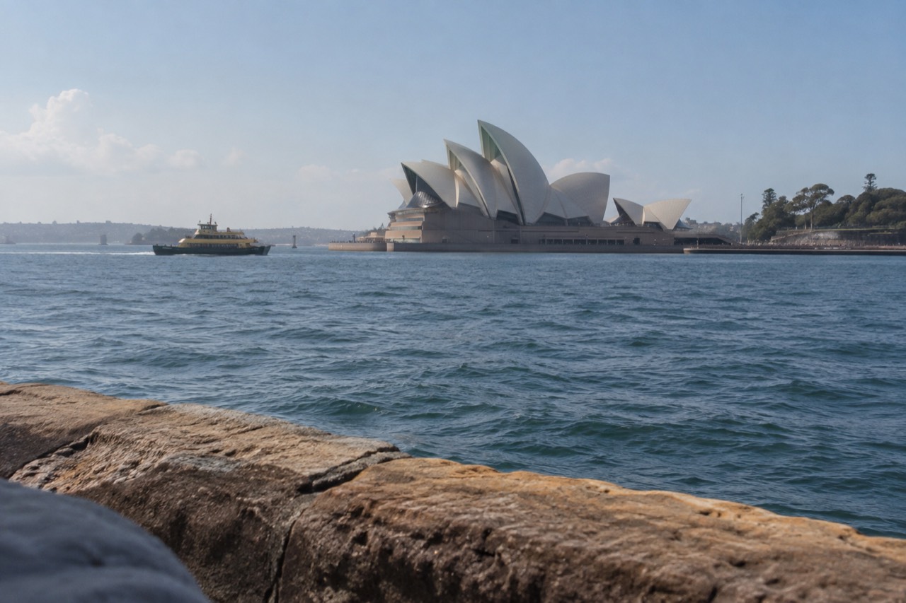 Sydney Opera House sails seen across Circular Quay on a clear morning